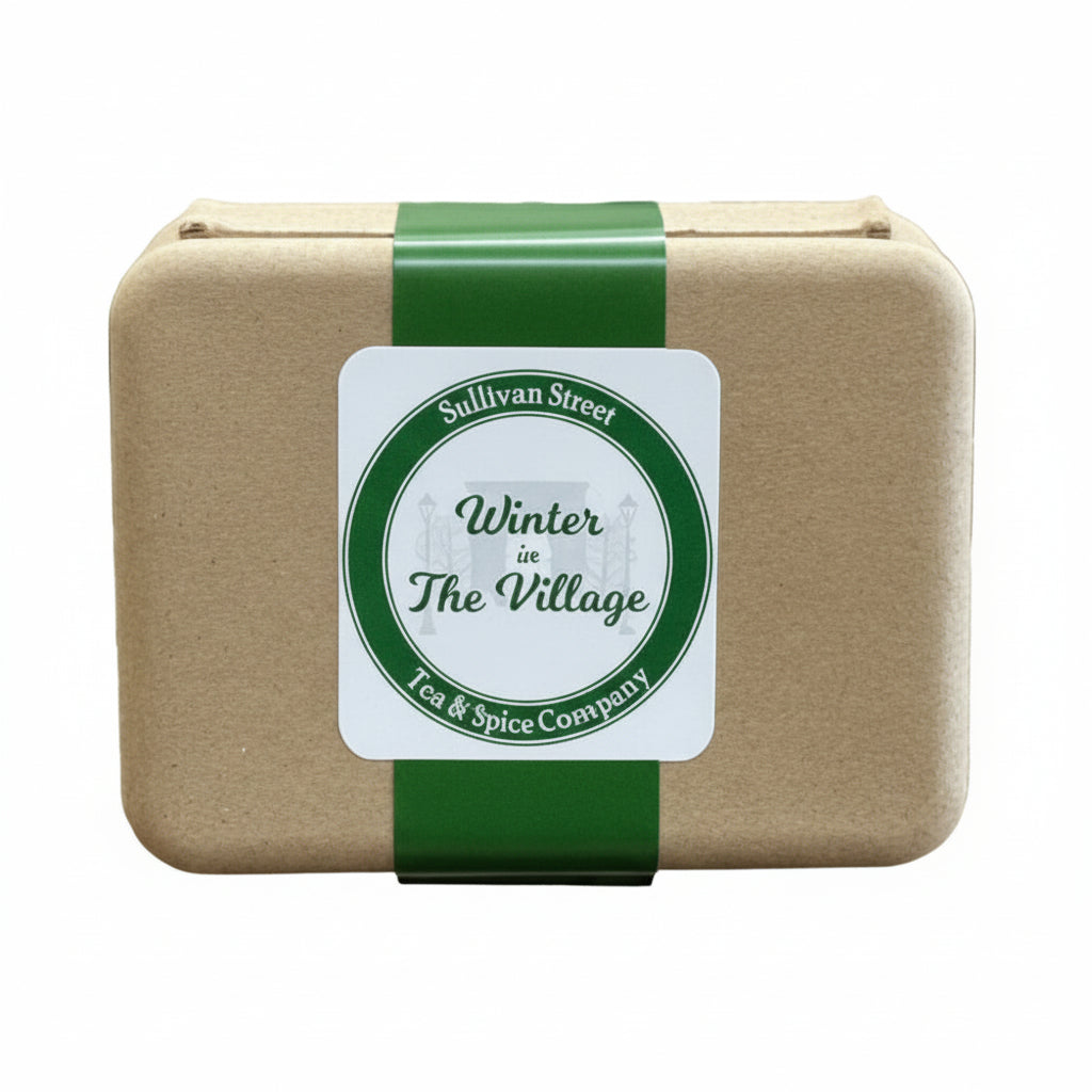 Tea packaging with a label from Sullivan Street Tea & Spice Company on a stand.