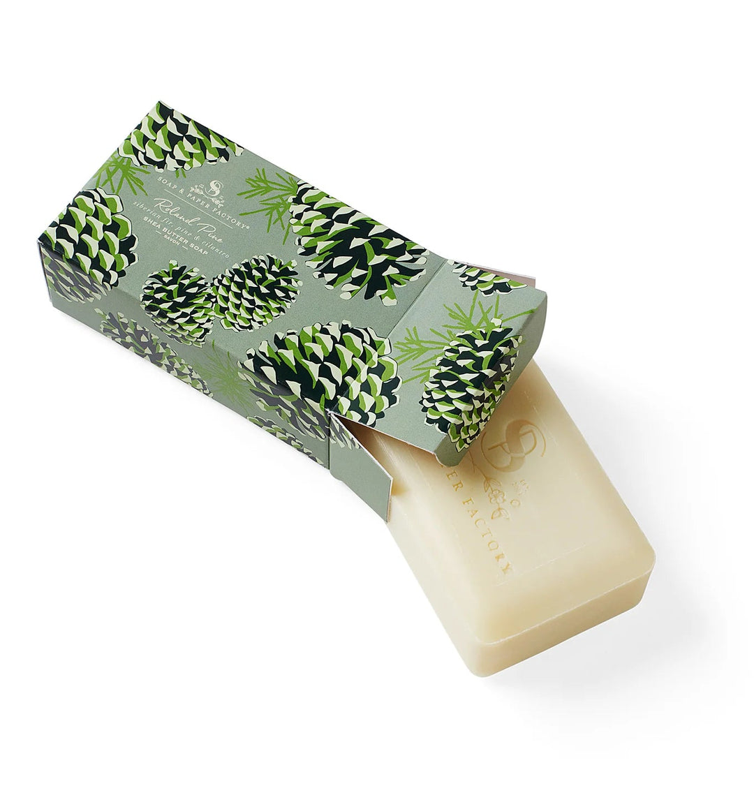 Bar of soap with a green packaging featuring pinecones on a white background