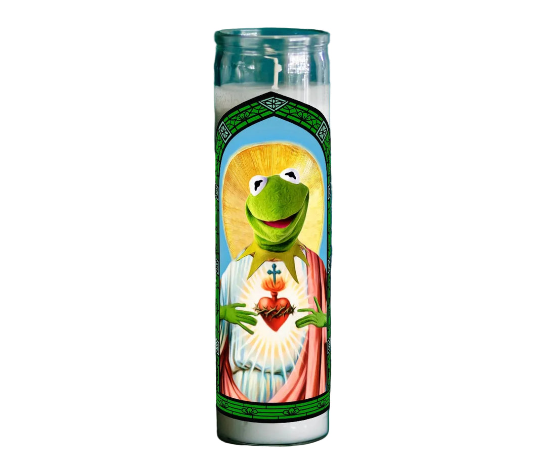 Candle with Kermit the Frog design on a dark blue background