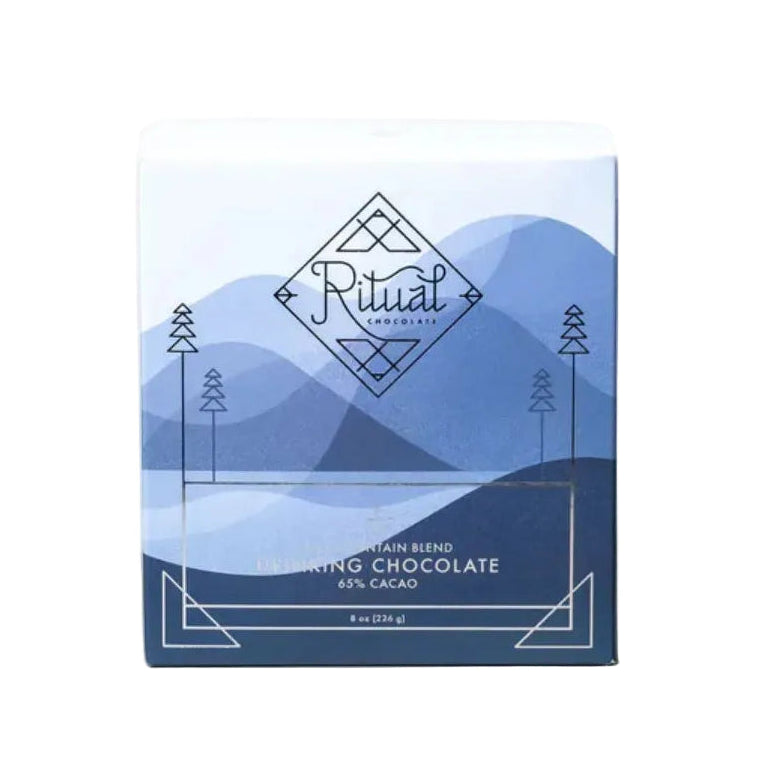Chocolate packaging with mountain design and 'Pitual' branding on a white background
